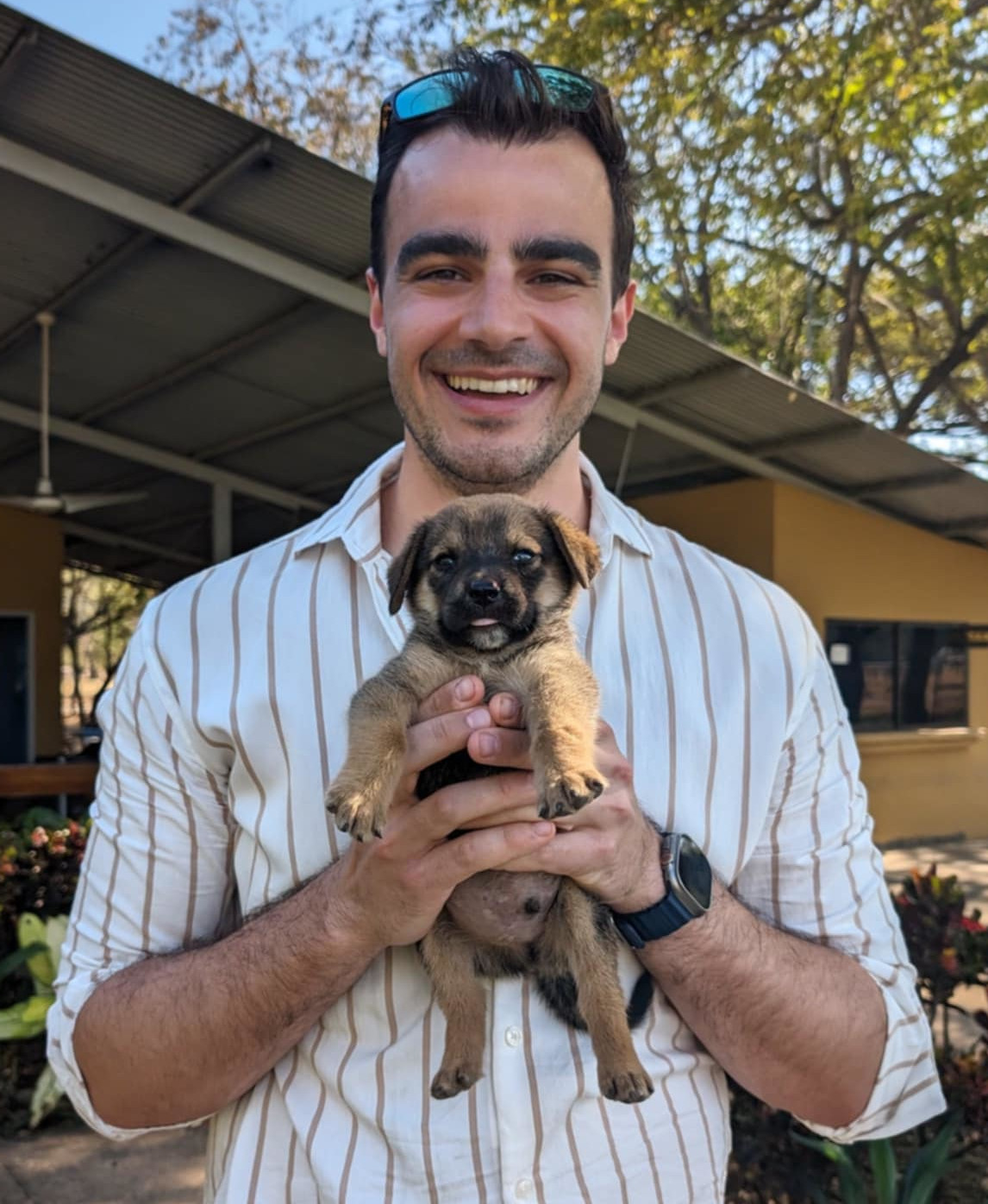 Man with puppy.